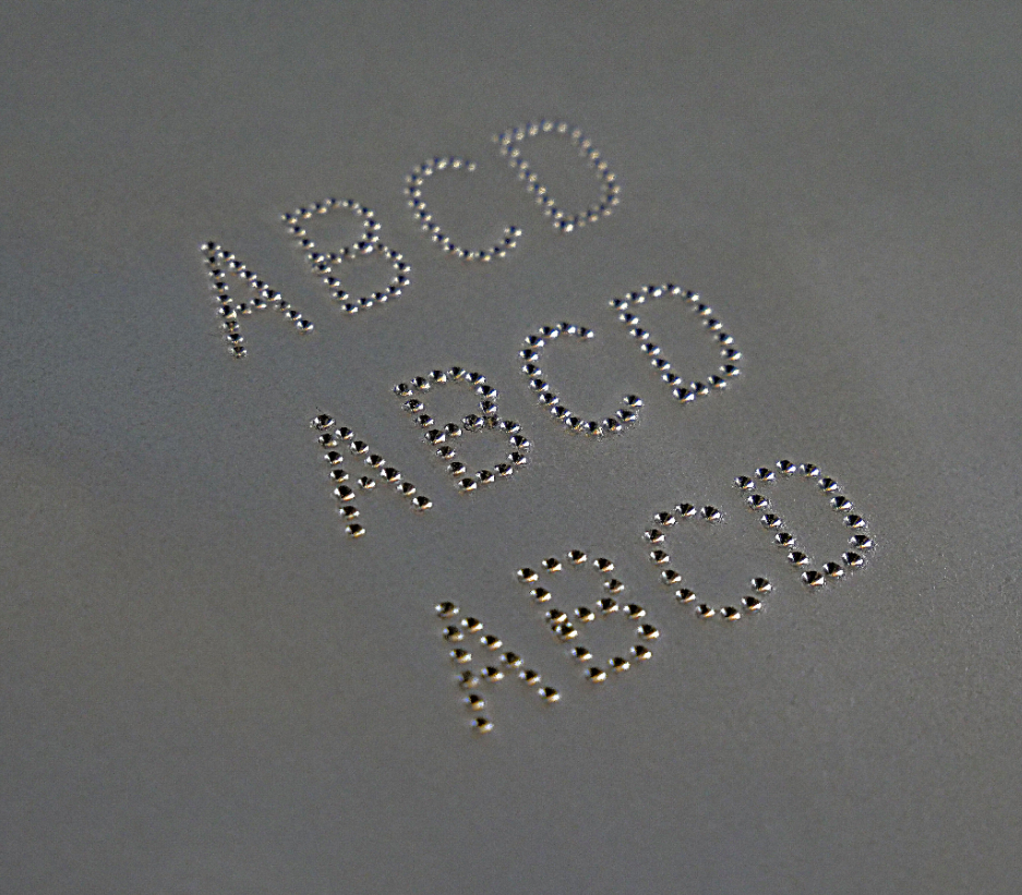 Texto y numeración marcados por micropercusión con el XF510m